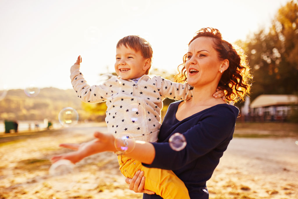 mom and son having fun by the lake PGUMLLD 1024x683 - Mbrace - Blog