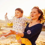 mom and son having fun by the lake PGUMLLD 150x150 - Correcting Malocclusion with Invisalign - Test 2