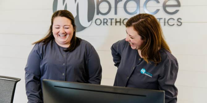 Candid Mbrace Orthodontics Falmouth Maine 2023 EO 107 670x335 - Our Empowering Team